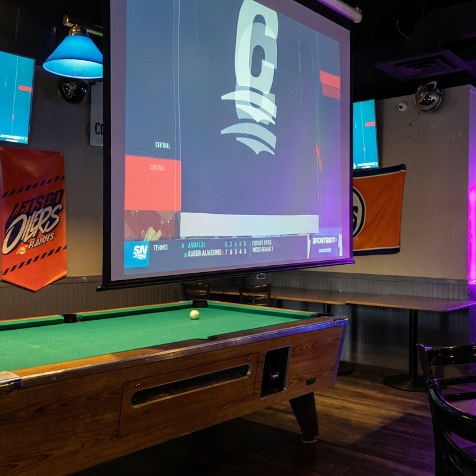 Sports bar interior featuring a pool table, large game screens, colorful banners, arcade machines, and purple accent lighting.