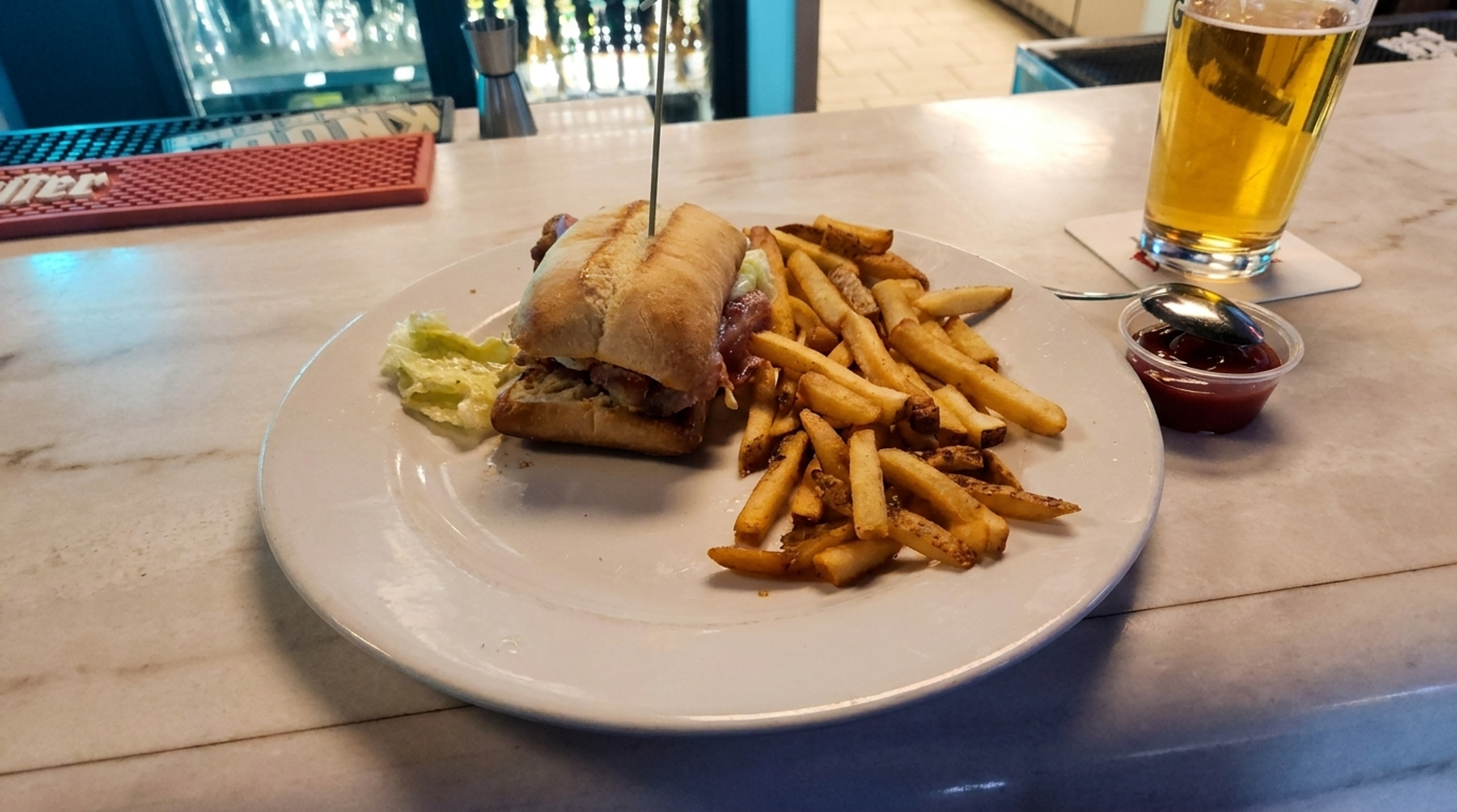 A cold beer and a beef dip
